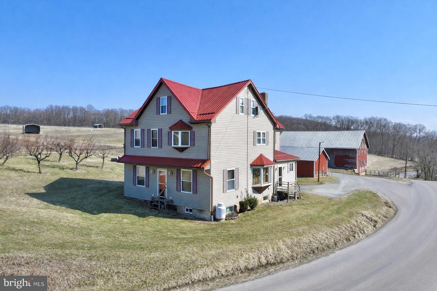 810 Mile Run Road Sunbury, PA 17801 - Photo 2 of 4 a view of a house with a yard
