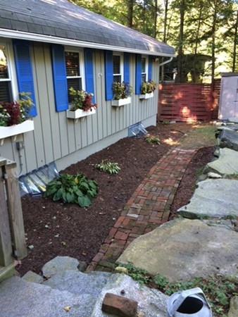 176 South Chesterfield Road Goshen, MA 01096 - Photo 12 of 21 a front view of a house with a porch
