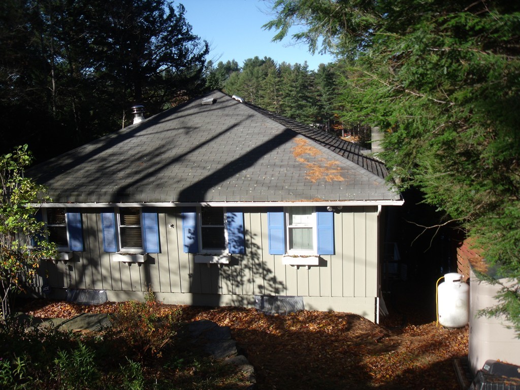 176 South Chesterfield Road Goshen, MA 01096 - Photo 14 of 21 a front view of a house with a yard