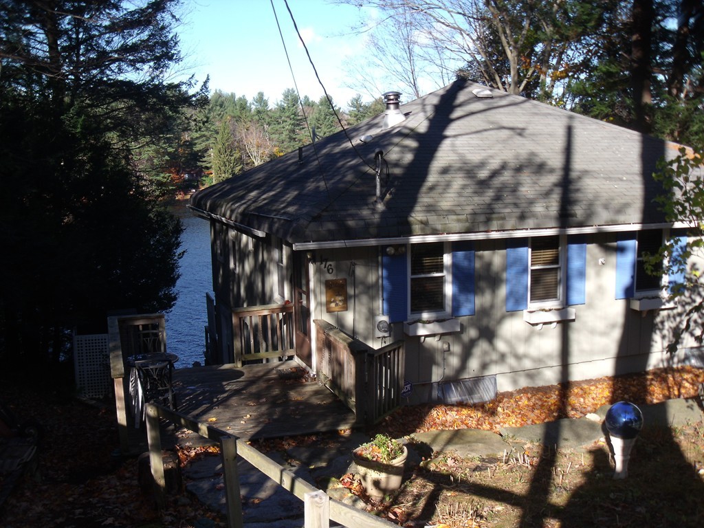 176 South Chesterfield Road Goshen, MA 01096 - Photo 15 of 21 a view of a house with backyard and sitting area
