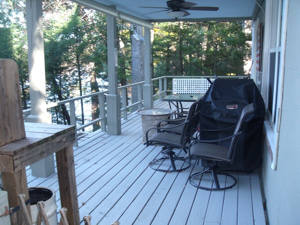 176 South Chesterfield Road Goshen, MA 01096 - Photo 17 of 21 a view of a balcony with furniture and wooden floor