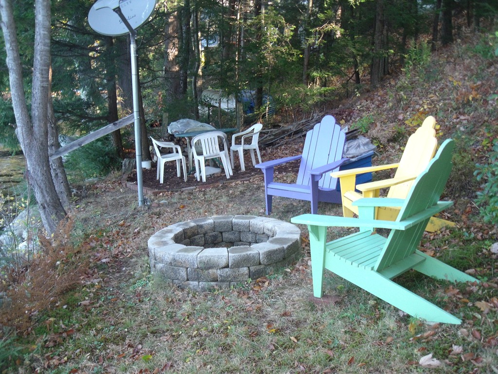 176 South Chesterfield Road Goshen, MA 01096 - Photo 21 of 21 a backyard of a house with table and chairs