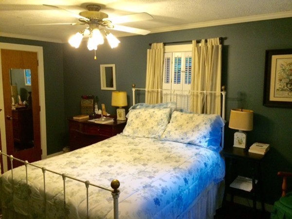 176 South Chesterfield Road Goshen, MA 01096 - Photo 5 of 21 a bed sitting in a bedroom next to a window
