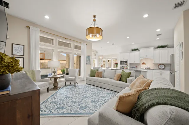 an aerial view of a house with outdoor space