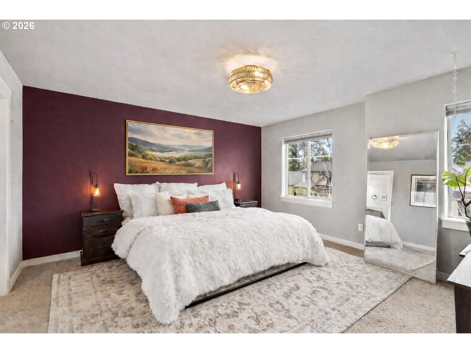 60439 Hedgewood Lane Bend, OR 97702 - Photo 12 of 44 a bedroom with a bed and a large window