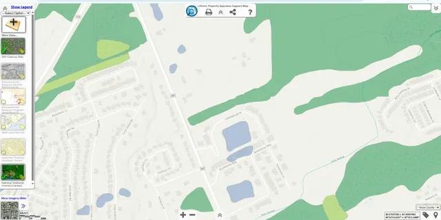 a view of a swimming pool with a yard