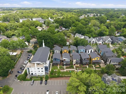an aerial view of a city with lots of residential buildings