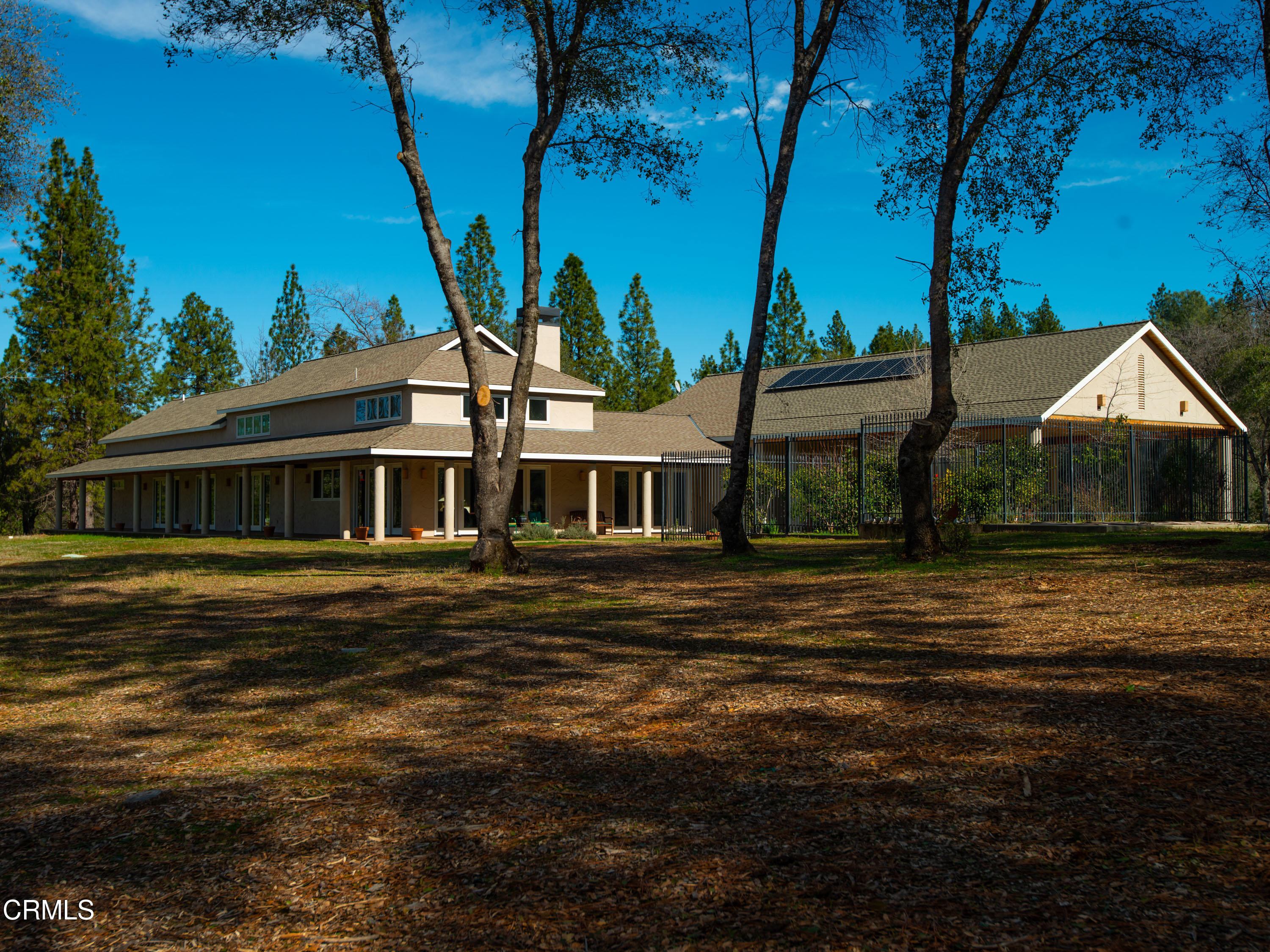 4000 Twin Ridges Road Garden Valley, CA 95633 - Photo 2 of 17 a front view of a house with a garden