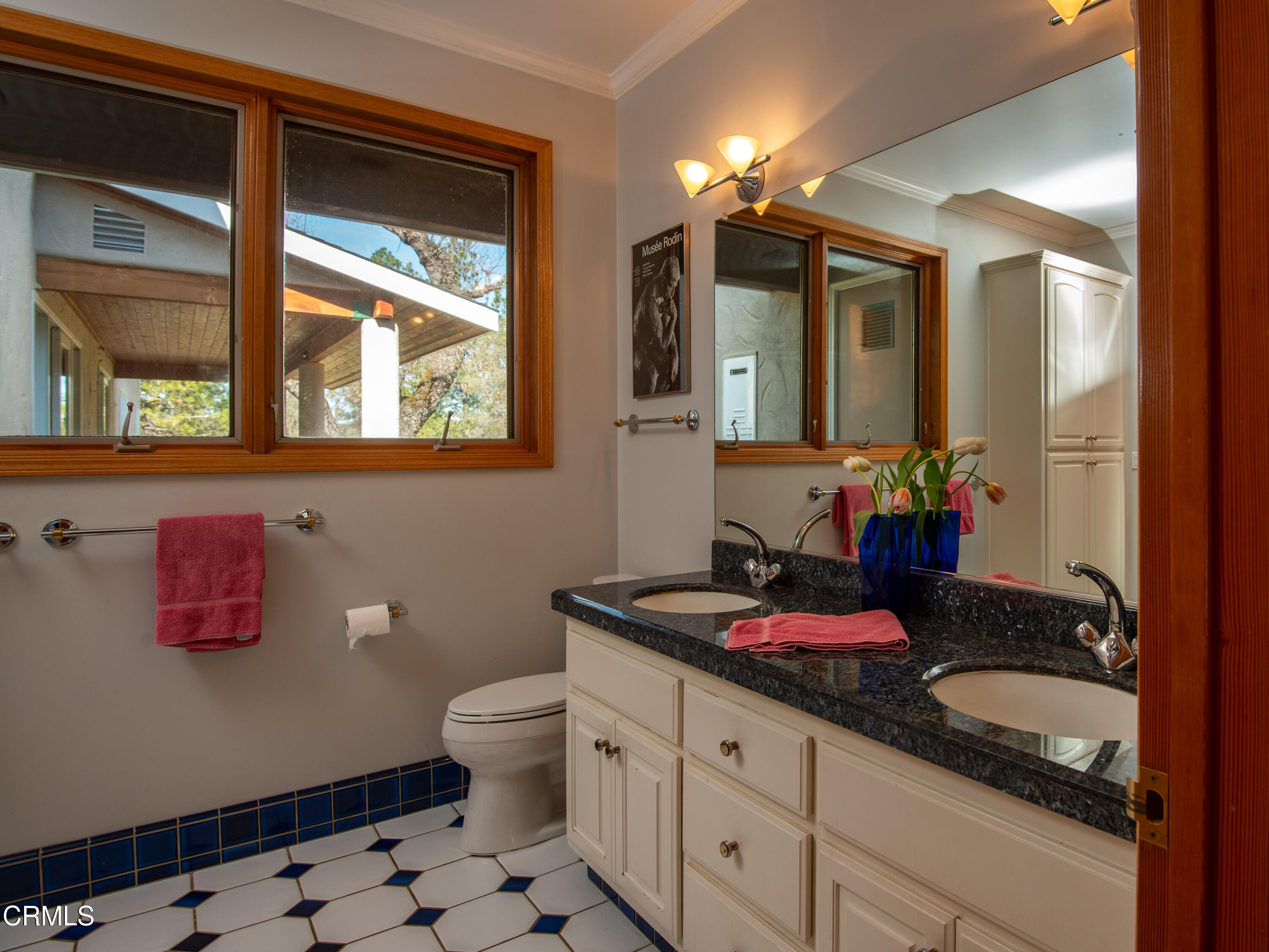 4000 Twin Ridges Road Garden Valley, CA 95633 - Photo 14 of 17 a bathroom with a granite countertop sink and a mirror