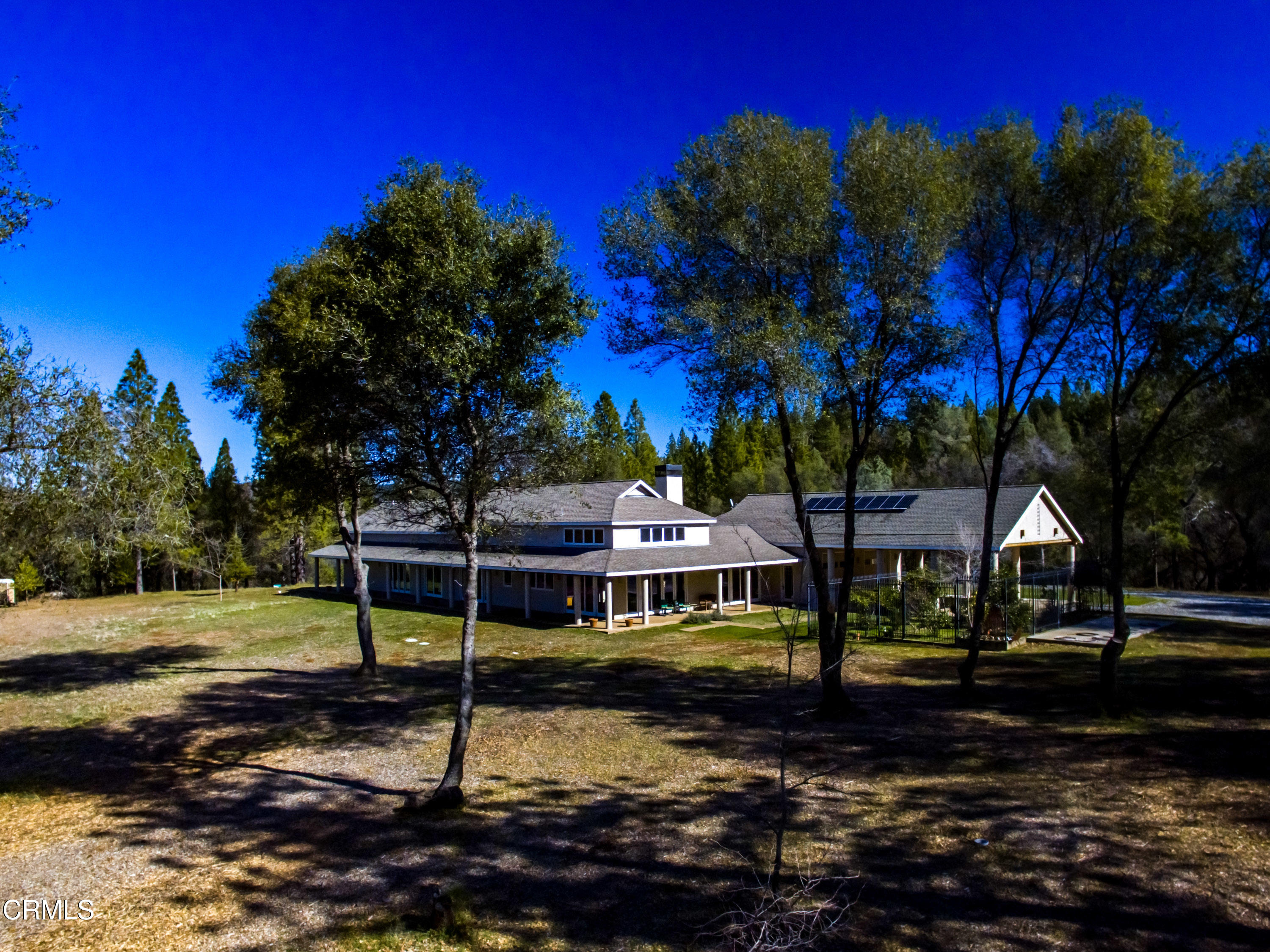 4000 Twin Ridges Road Garden Valley, CA 95633 - Photo 15 of 17 a view of a house with garden and trees