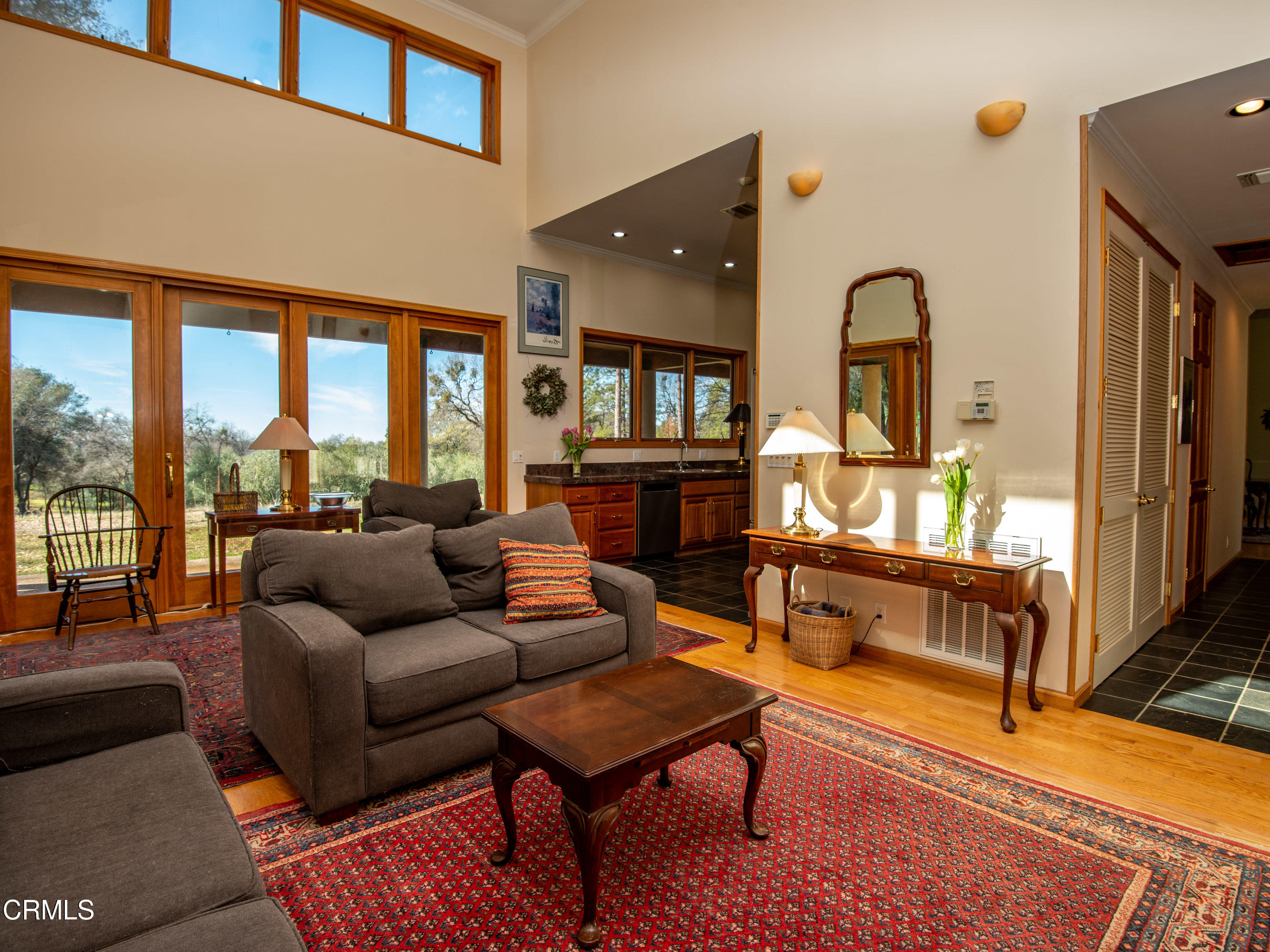 4000 Twin Ridges Road Garden Valley, CA 95633 - Photo 3 of 17 a living room with furniture and a large window