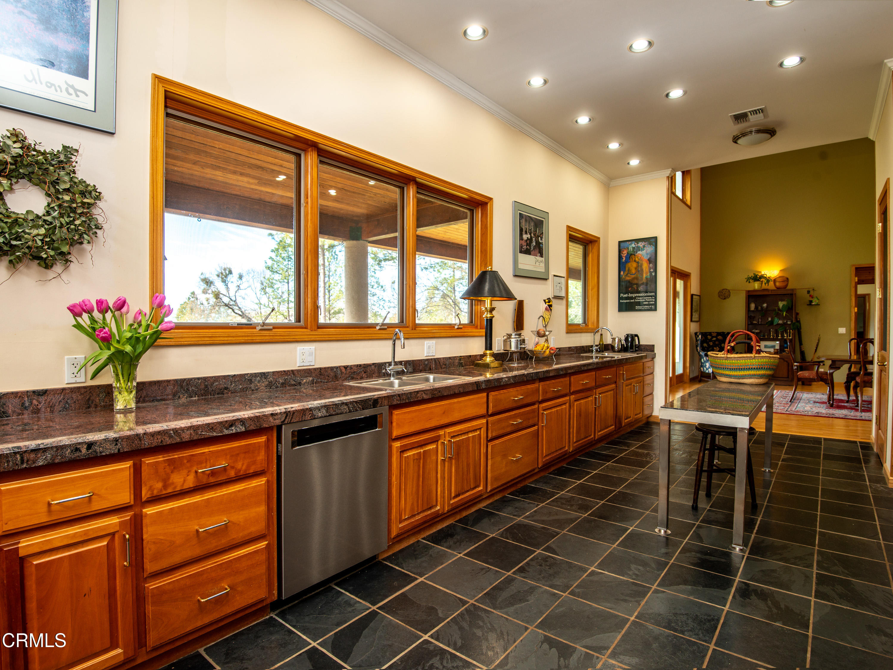 4000 Twin Ridges Road Garden Valley, CA 95633 - Photo 7 of 17 a large kitchen with granite countertop a sink and cabinets