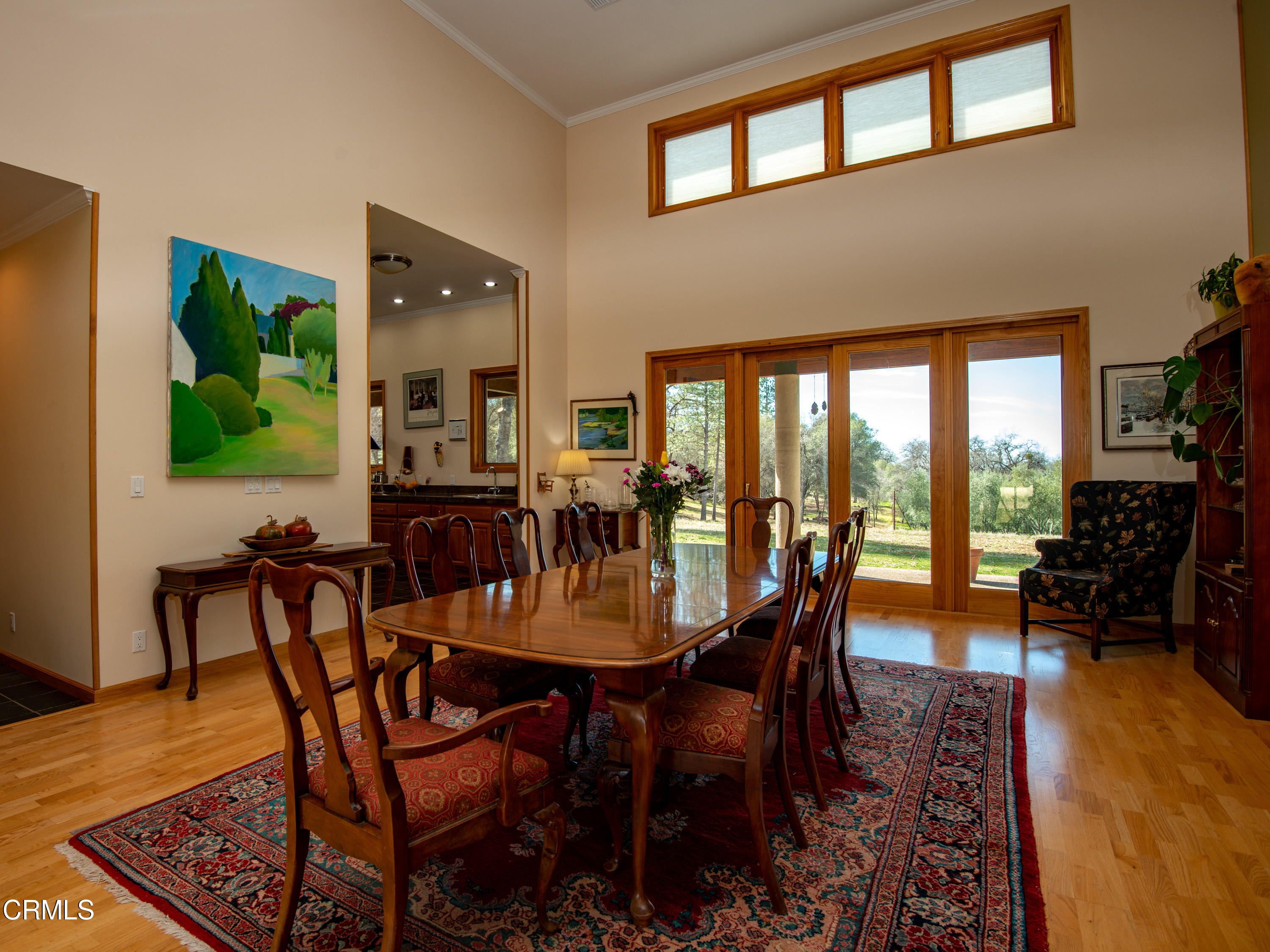 4000 Twin Ridges Road Garden Valley, CA 95633 - Photo 8 of 17 a view of a dining room with furniture a rug and wooden floor