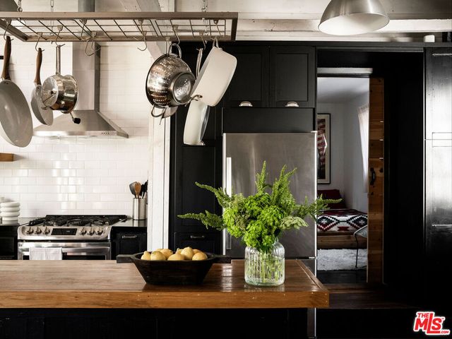 a vase of flowers sitting on a table