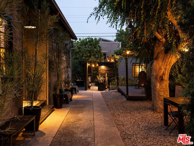 a view of a building with sitting area