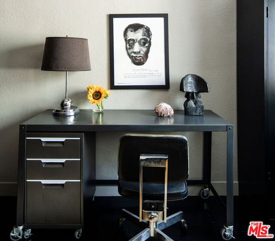 a room with furniture and a window