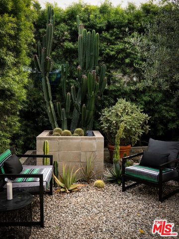 a outdoor living space with furniture and wooden floor