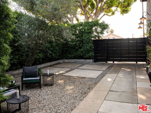 a view of a bench in the patio