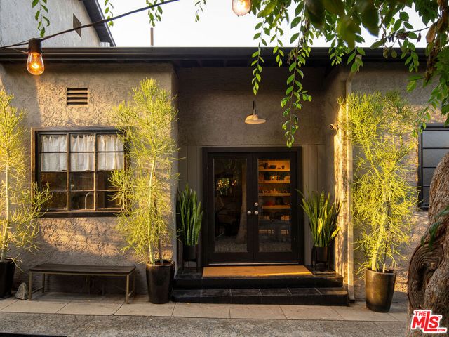 a front view of a house with a porch