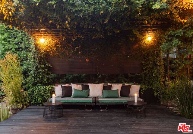 a view of a bench in a backyard