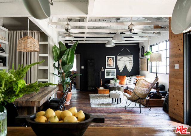 a outdoor living space with patio furniture and a potted plant