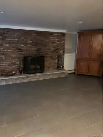 a living room with a fireplace