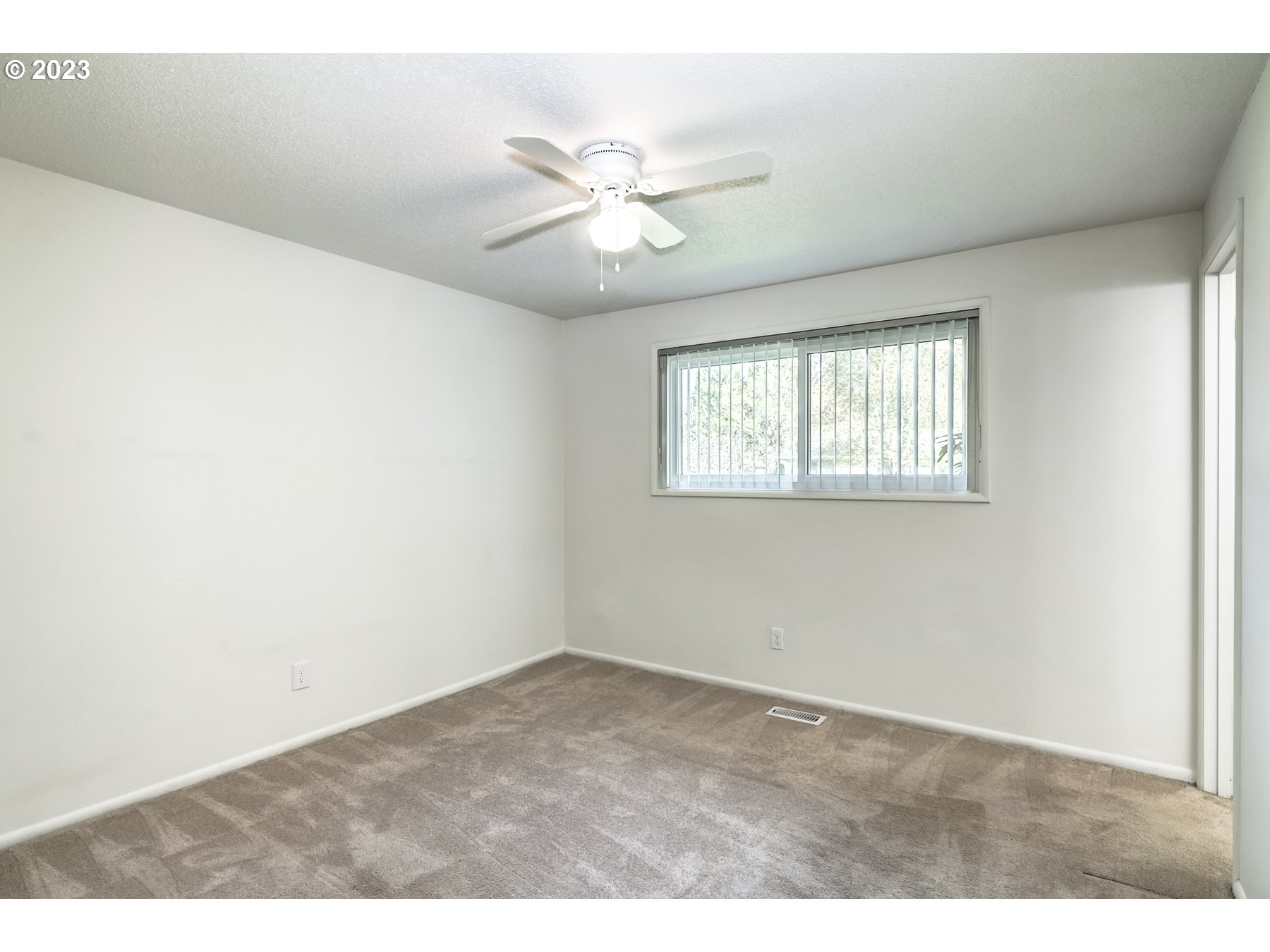 20430 Southwest Avon Court Beaverton, OR 97078 - Photo 18 of 29 a view of an empty room with a window