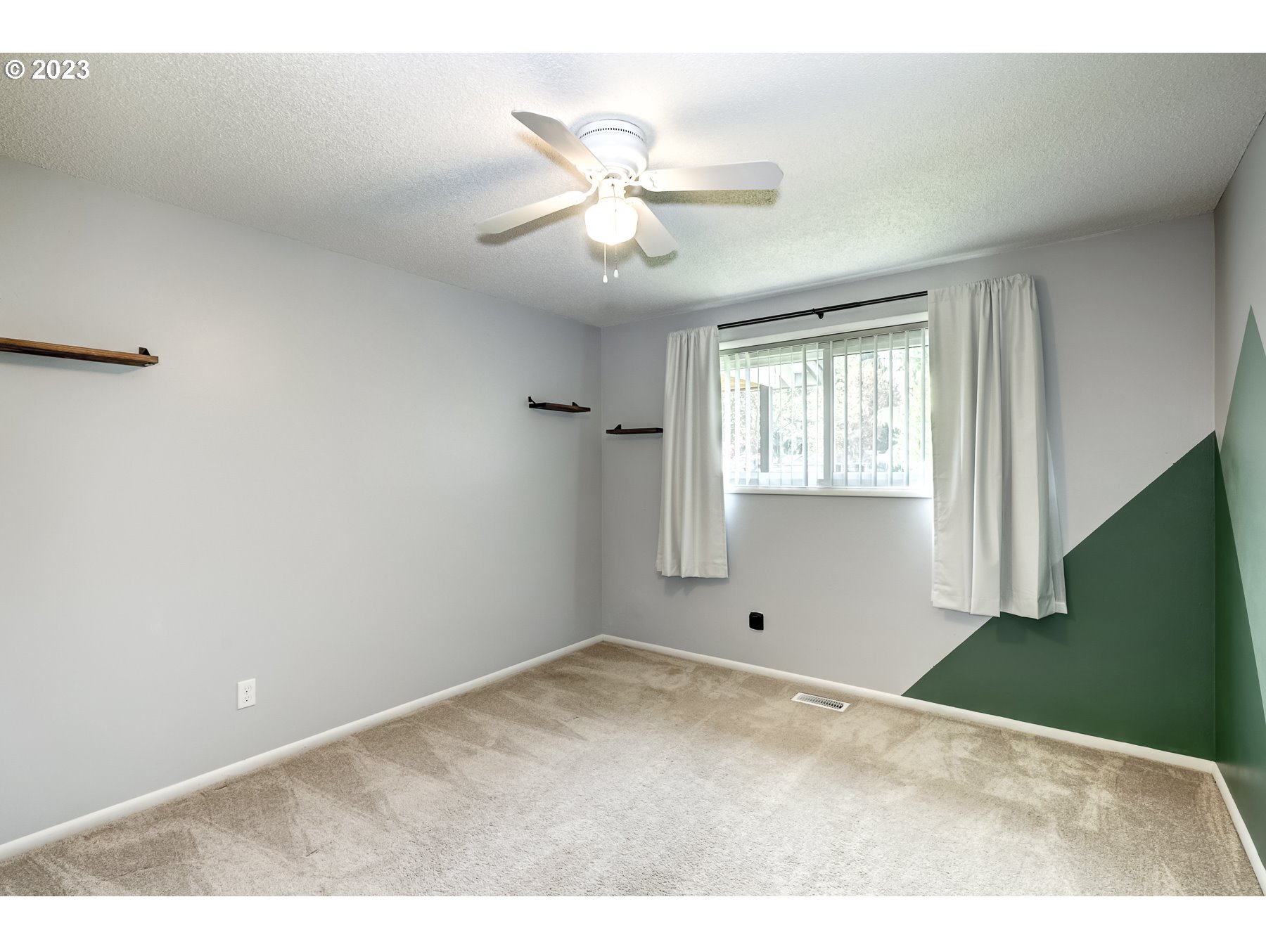 20430 Southwest Avon Court Beaverton, OR 97078 - Photo 21 of 29 a view of an empty room with a window