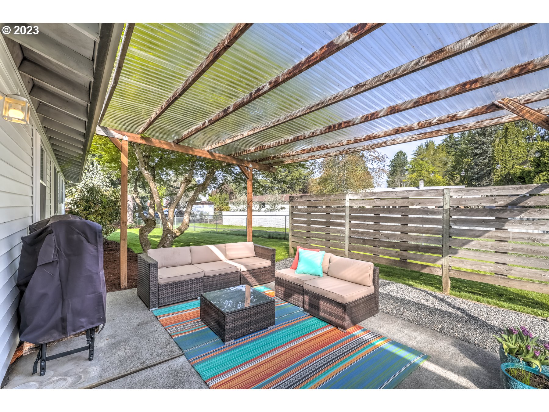 20430 Southwest Avon Court Beaverton, OR 97078 - Photo 24 of 29 a outdoor living room with furniture