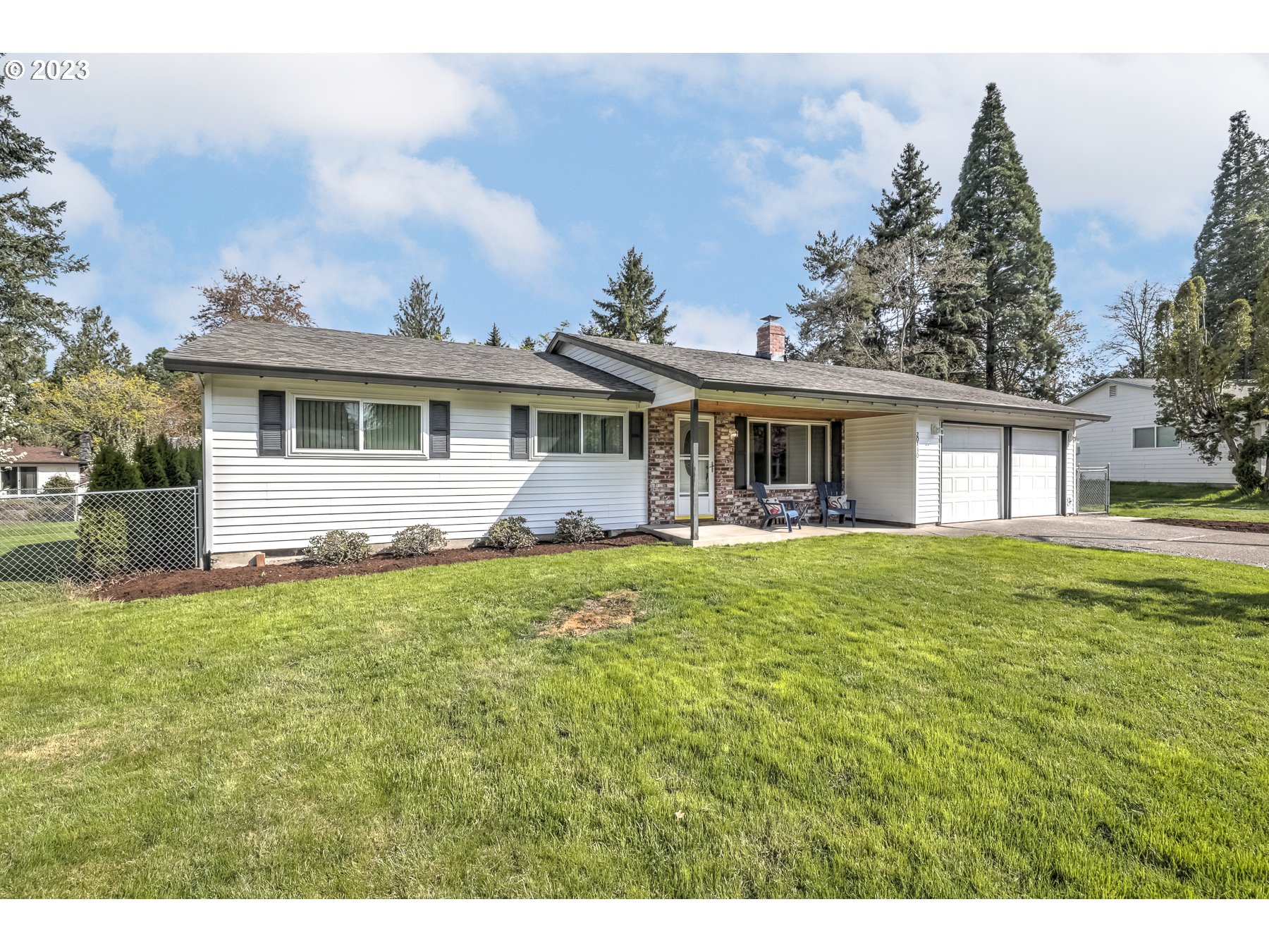 20430 Southwest Avon Court Beaverton, OR 97078 - Photo 29 of 29 a view of a house with a backyard