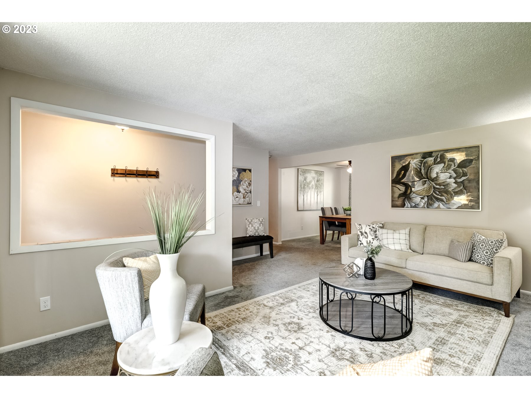 20430 Southwest Avon Court Beaverton, OR 97078 - Photo 8 of 29 a living room with furniture and a potted plant