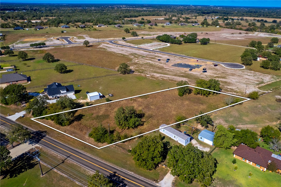10479 Steep Hollow Road Bryan, TX 77808 - Photo 4 of 6 an aerial view of a tennis court