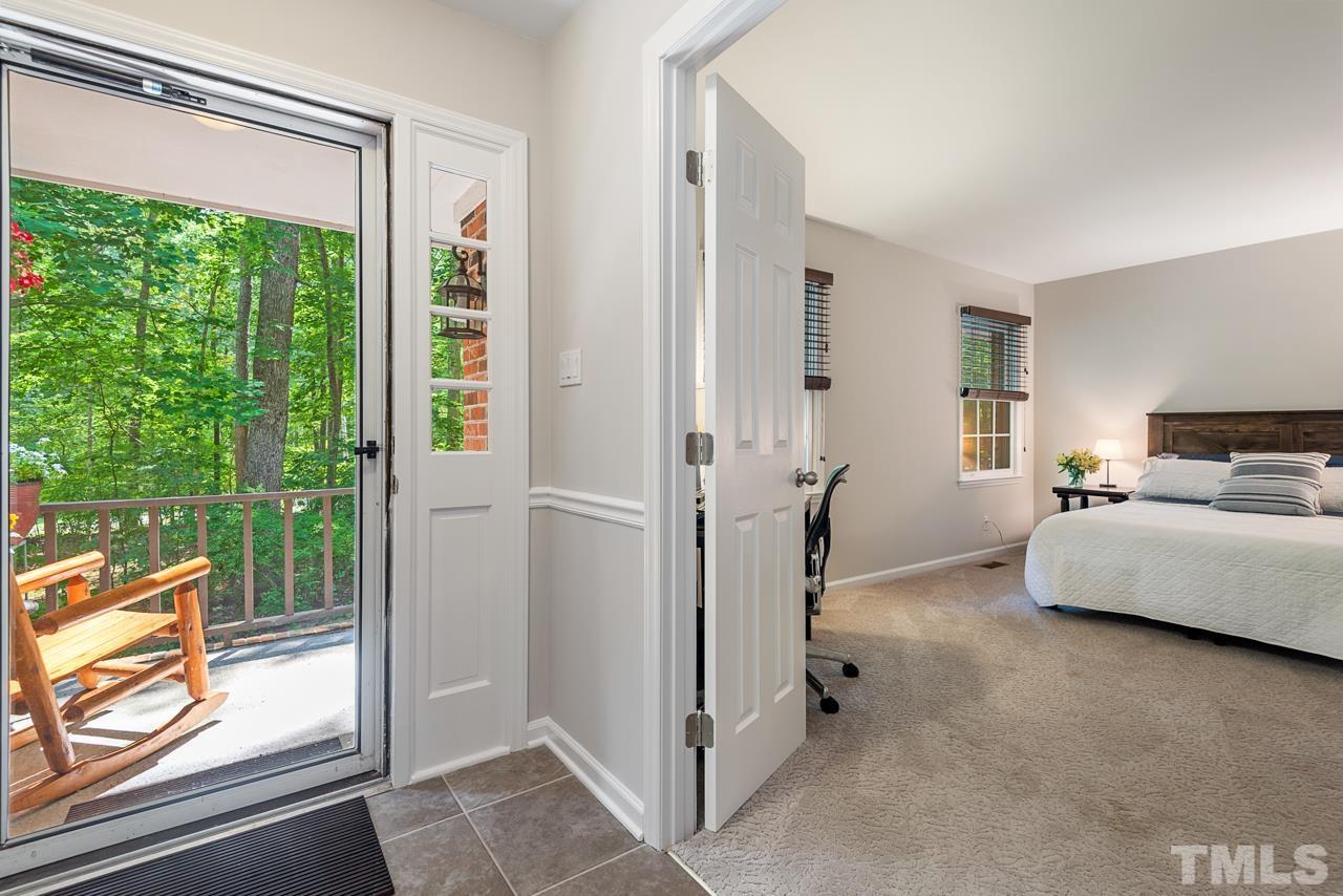 8201 Bromley Road Hillsborough, NC 27278 - Photo 6 of 77 a bedroom with furniture and a large window