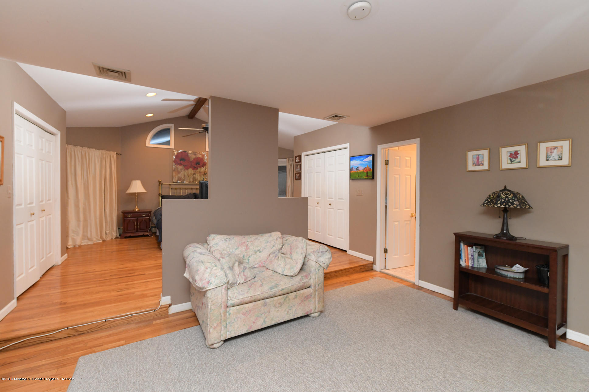 10 Gull Road Middletown, NJ 07748 - Photo 17 of 18 a living room with furniture and a table