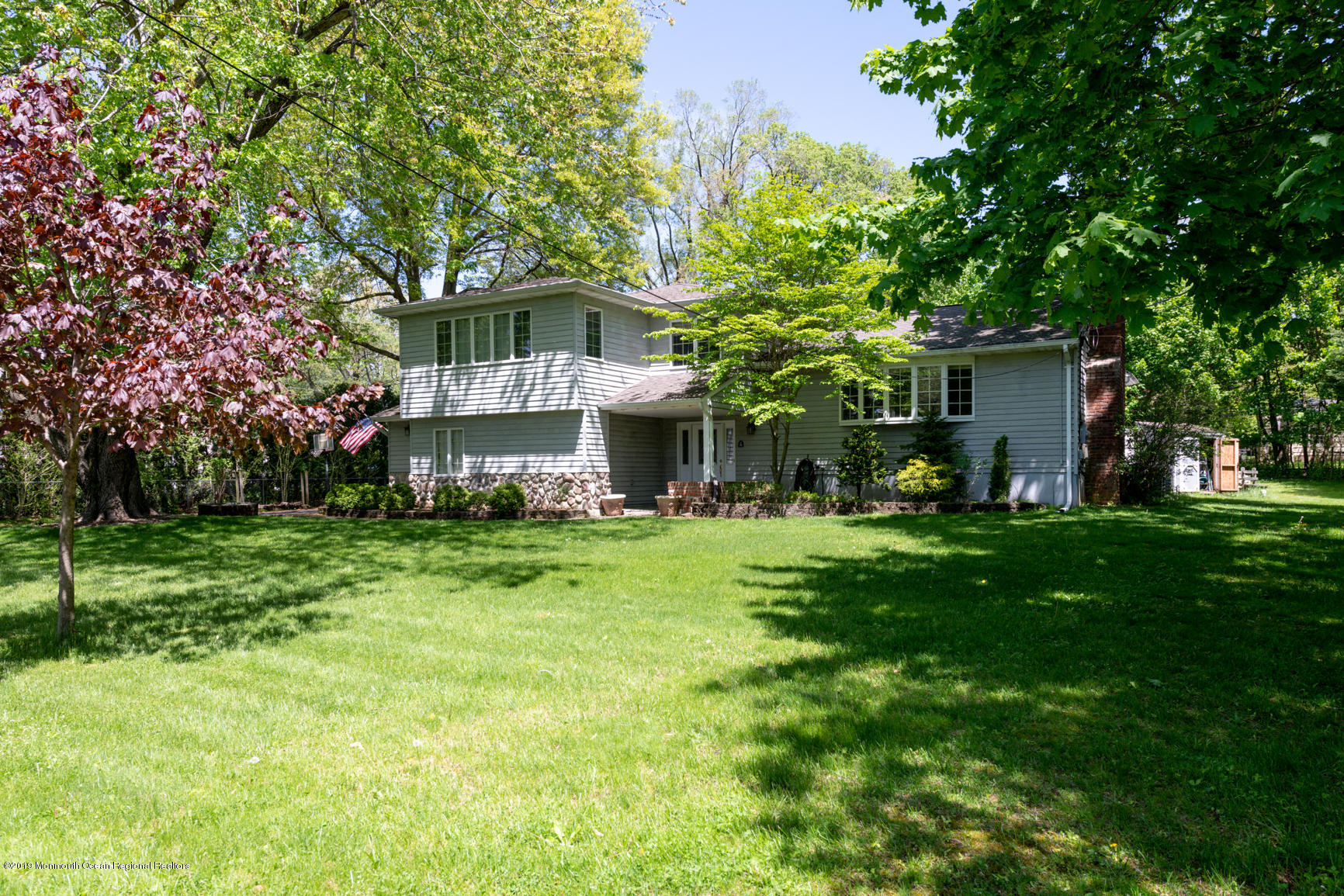 10 Gull Road Middletown, NJ 07748 - Photo 18 of 18 a front view of a house with a garden