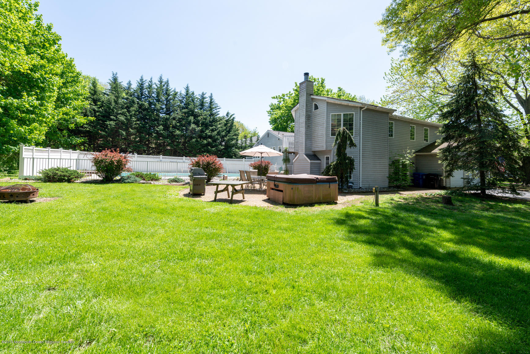 10 Gull Road Middletown, NJ 07748 - Photo 2 of 18 a view of a house with backyard and sitting area