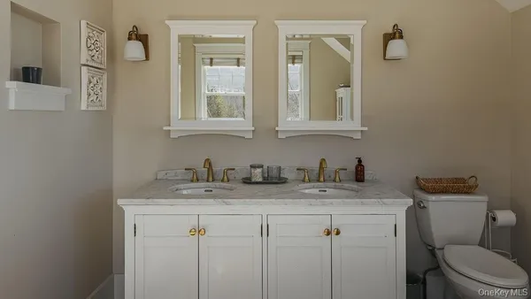 a bathroom with a sink and a toilet