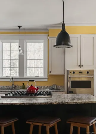 a table and chairs in a kitchen