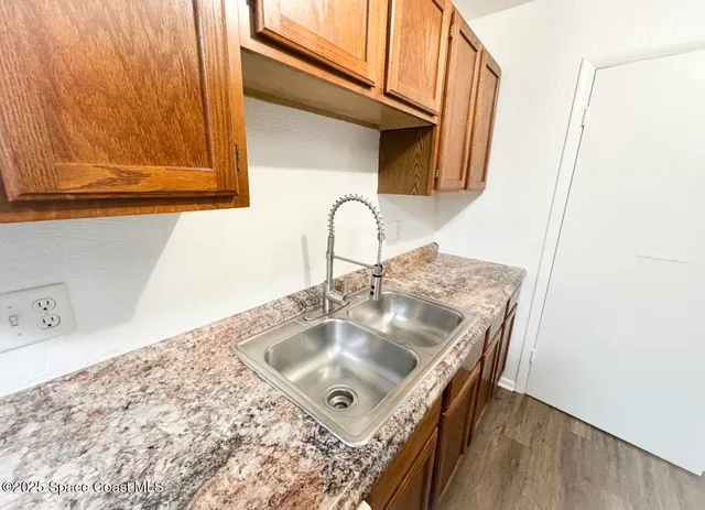 a view of a wooden street from a balcony