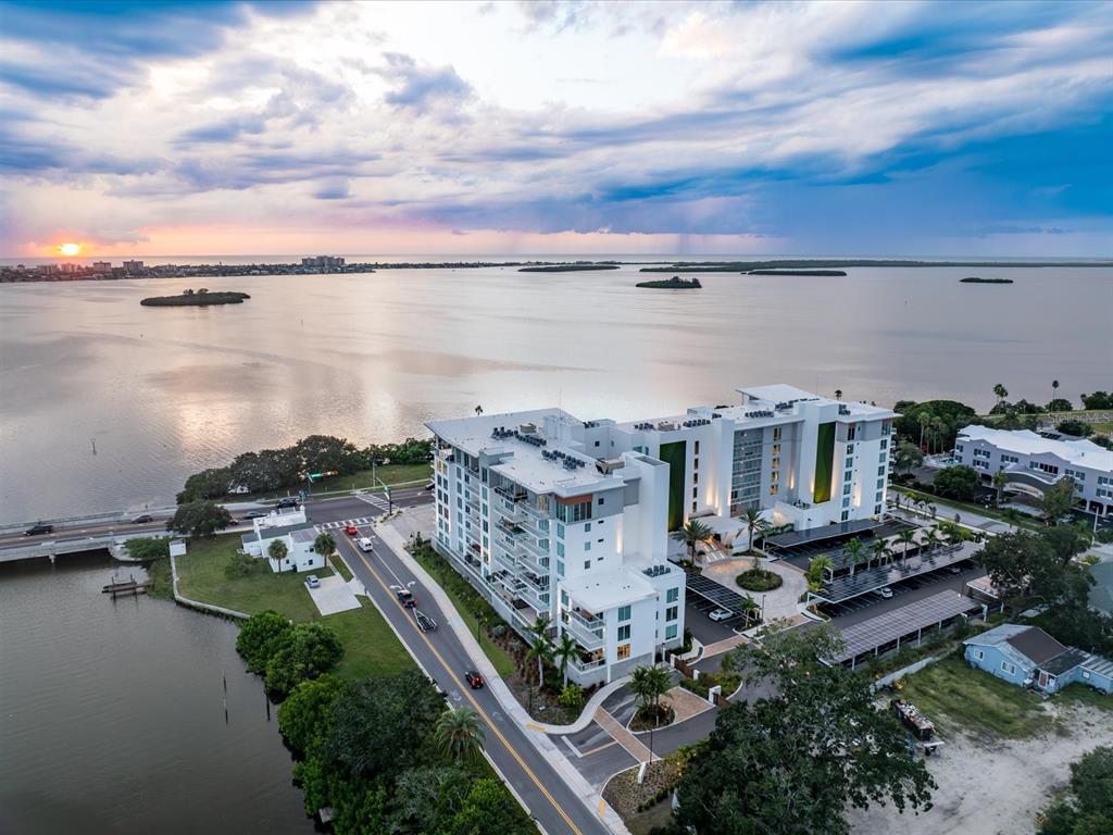 1020 Sunset Point Road, Unit 511 Clearwater, FL 33755 - Photo 3 of 93 a view of a lake with a city