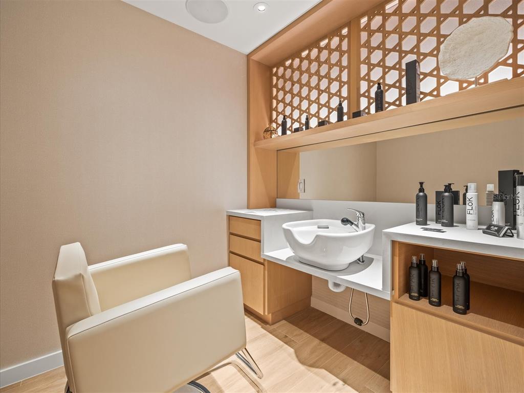 1020 Sunset Point Road, Unit 511 Clearwater, FL 33755 - Photo 37 of 93 a bathroom with a sink and a bathtub
