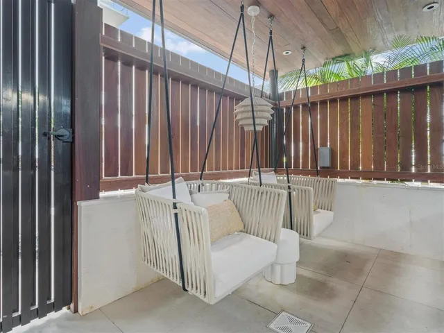 a view of a lake with houses in the back