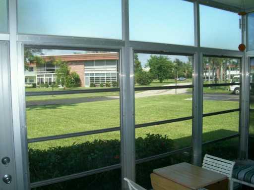 1225 Northwest 21st Street, Unit 3105 Stuart, FL 34994 - Photo 7 of 8 a view of a room and window