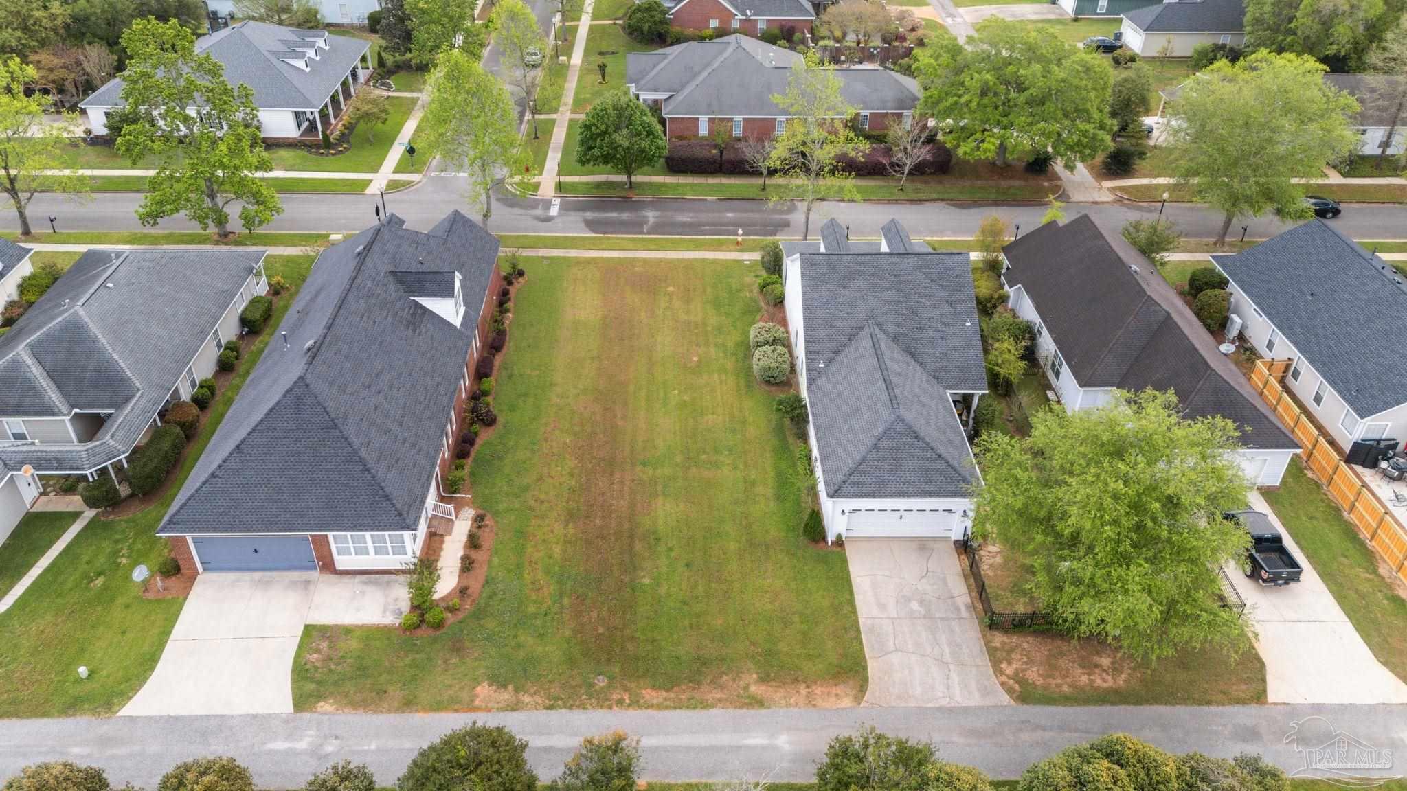 0 St Basil Street Daphne, AL 36526 - Photo 4 of 4 an aerial view of residential houses with outdoor space and swimming pool