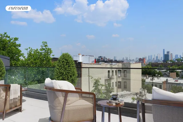 a view of a balcony with two chairs and a table
