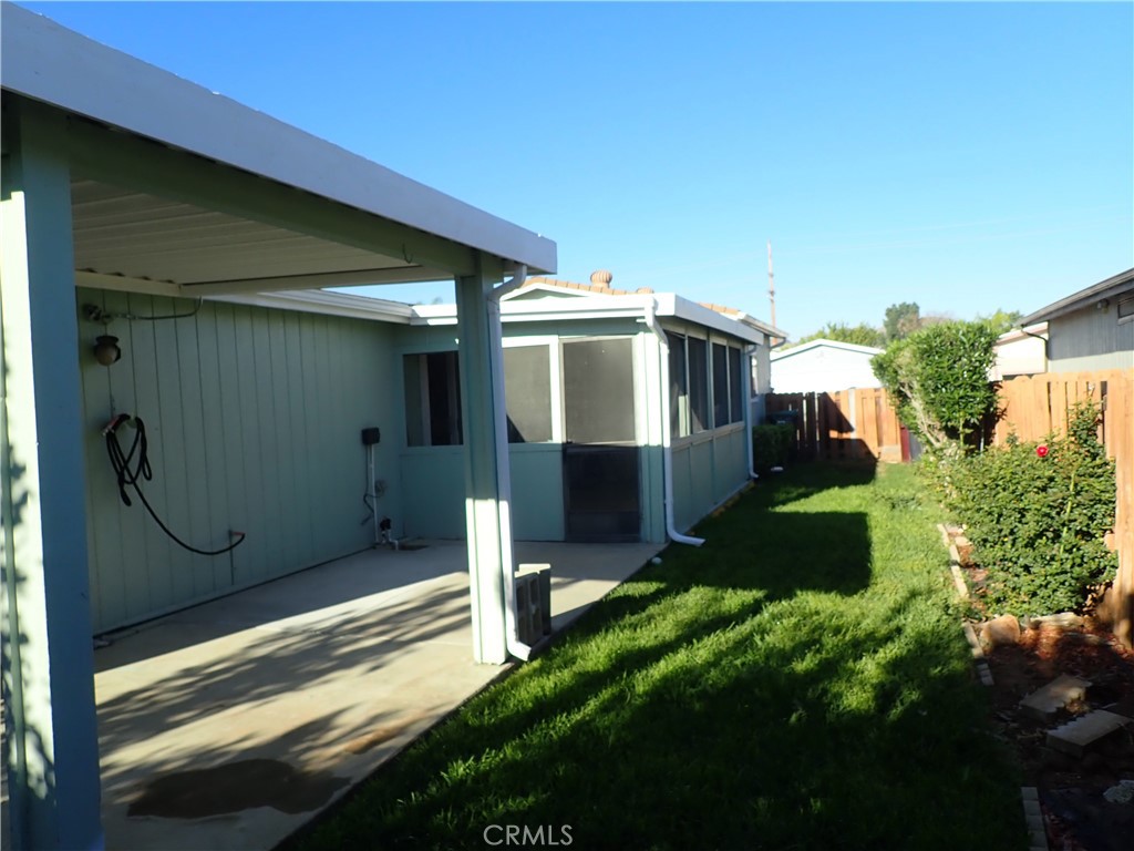27250 Murrieta Road, Unit 386 Menifee, CA 92586 - Photo 29 of 32 a house view with a backyard space