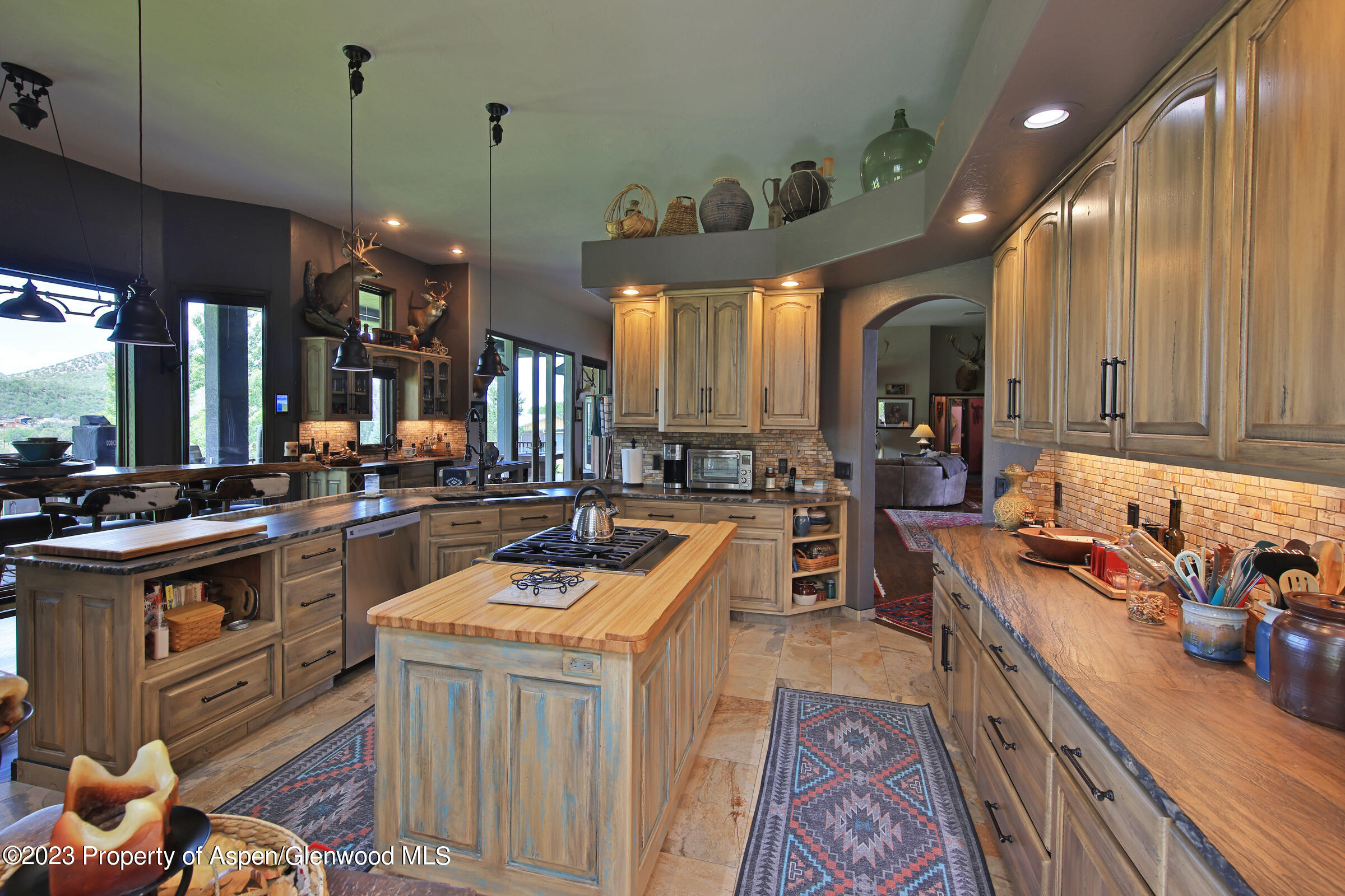 52962 KE Road Molina, CO 81646 - Photo 12 of 46 a kitchen filled counter top space a sink appliances and cabinets
