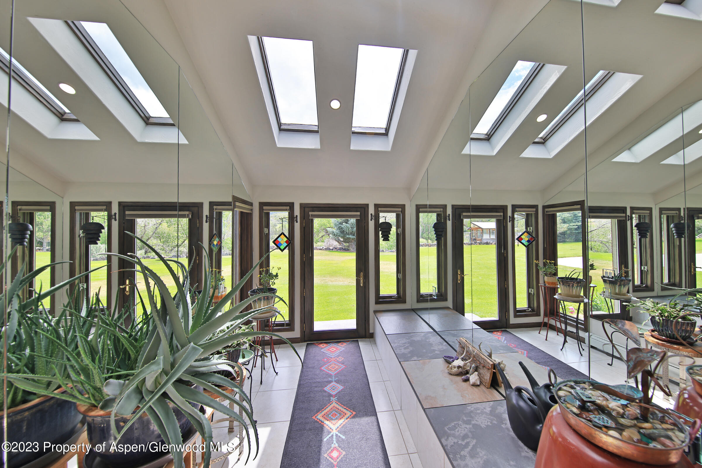 52962 KE Road Molina, CO 81646 - Photo 13 of 46 a living room with furniture and large windows