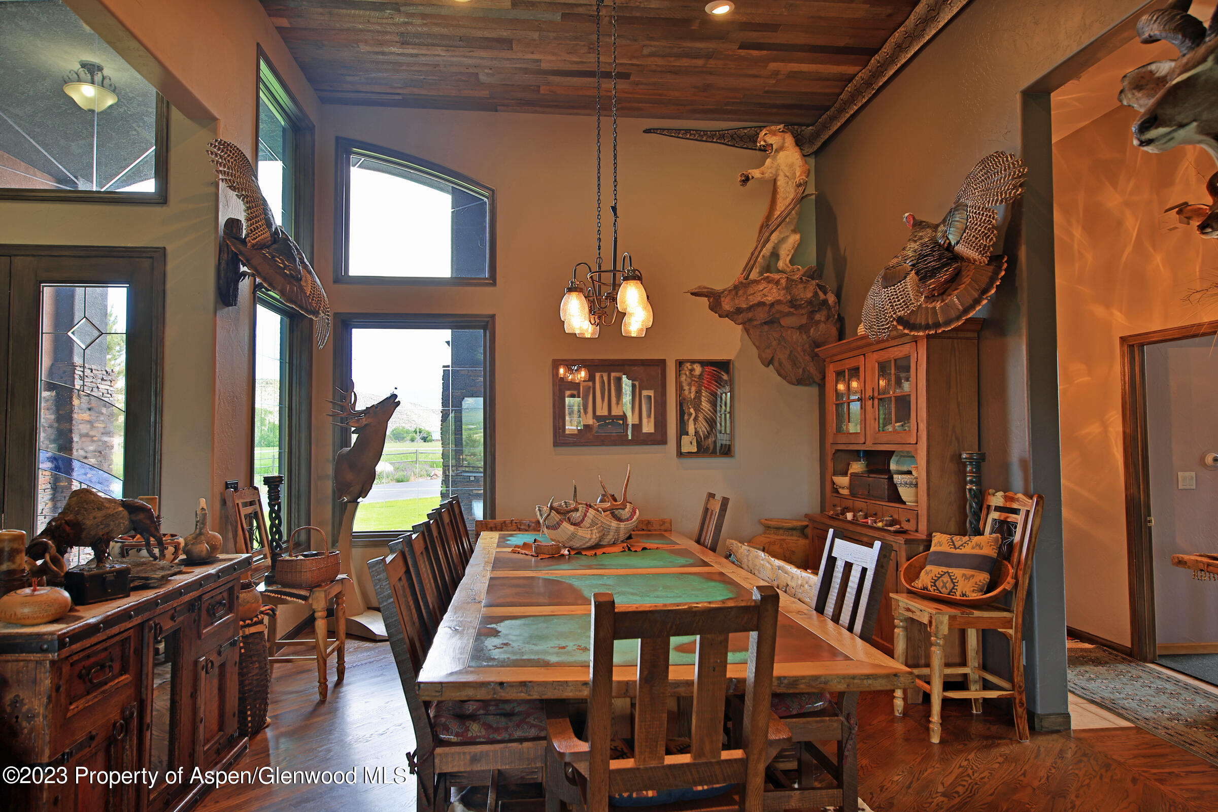 52962 KE Road Molina, CO 81646 - Photo 14 of 46 a view of a dining room with furniture and chandelier