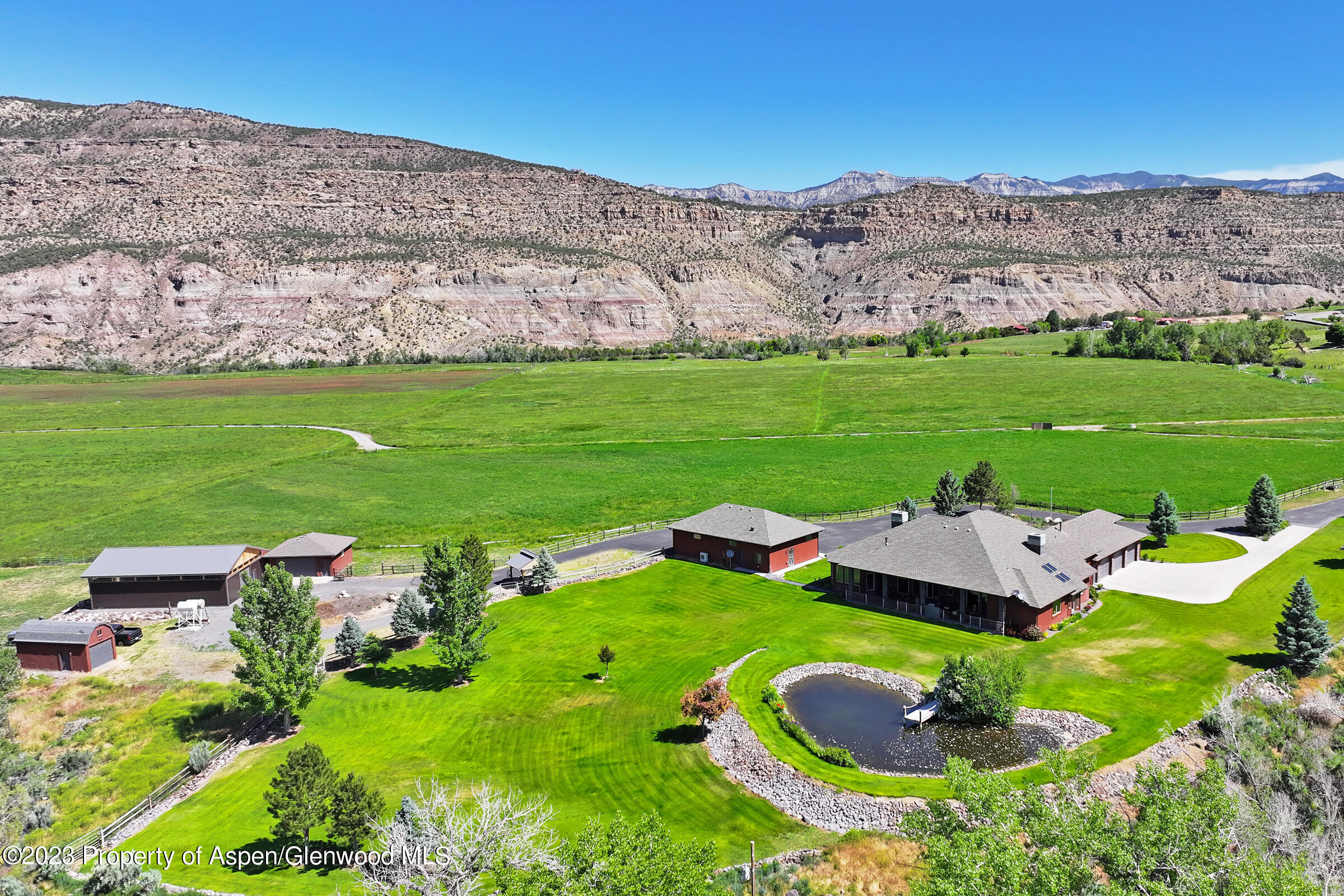 52962 KE Road Molina, CO 81646 - Photo 2 of 46 a view of outdoor space and mountain view in back
